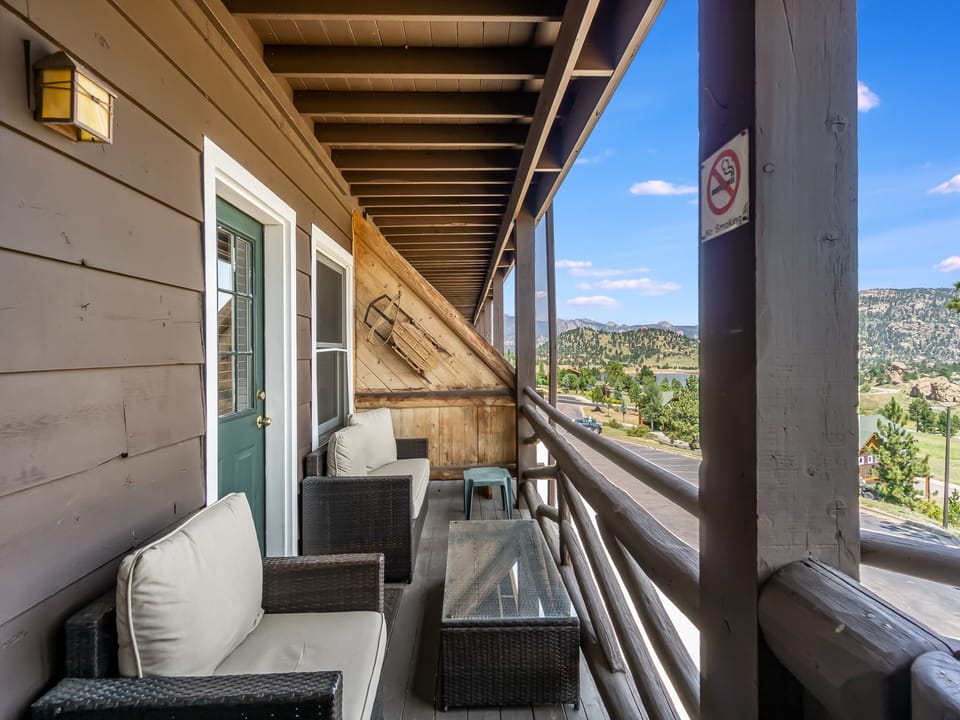 Hallett Peak 101 - Cushioned patio seating on the condo's deck.