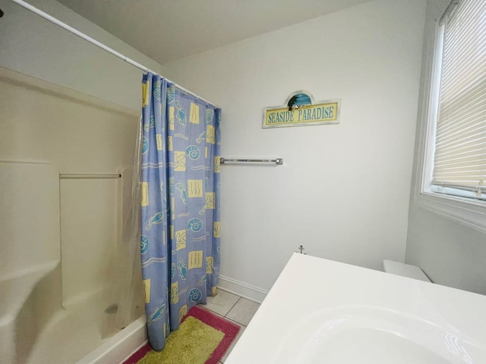 Lower Level Bathroom Connected To Bedroom 1