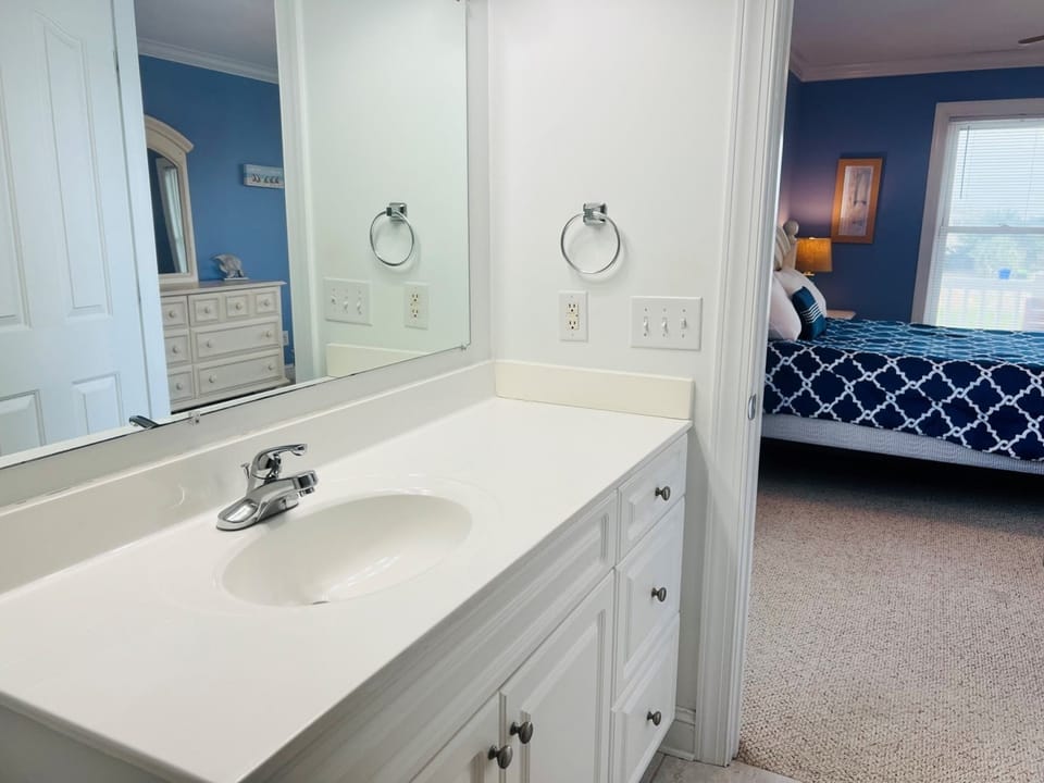 Lower Level Bathroom Connected To Bedroom 1