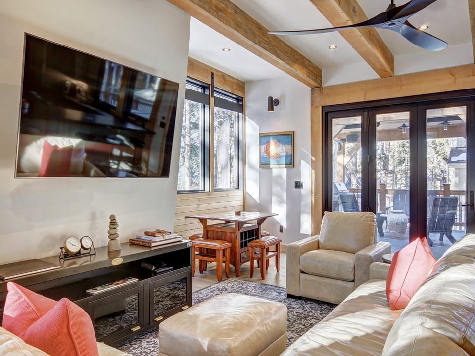 Additional view of living area and open kitchen on main level - Arrow Darrow Breckenridge Vacation Rental