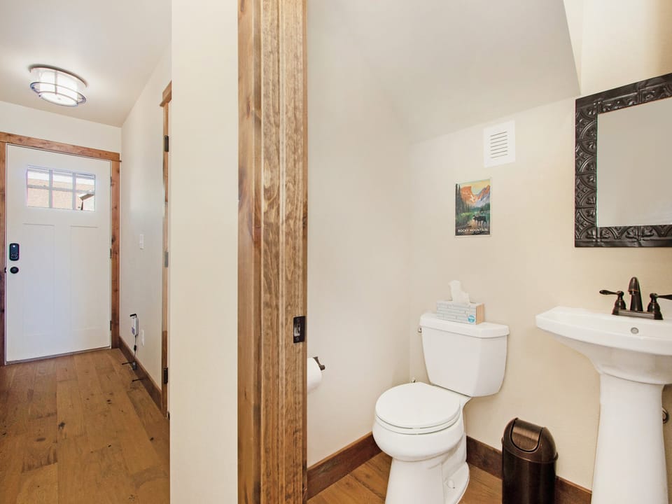Hawkeye Ridge - Guest bathroom near main entrance of home.