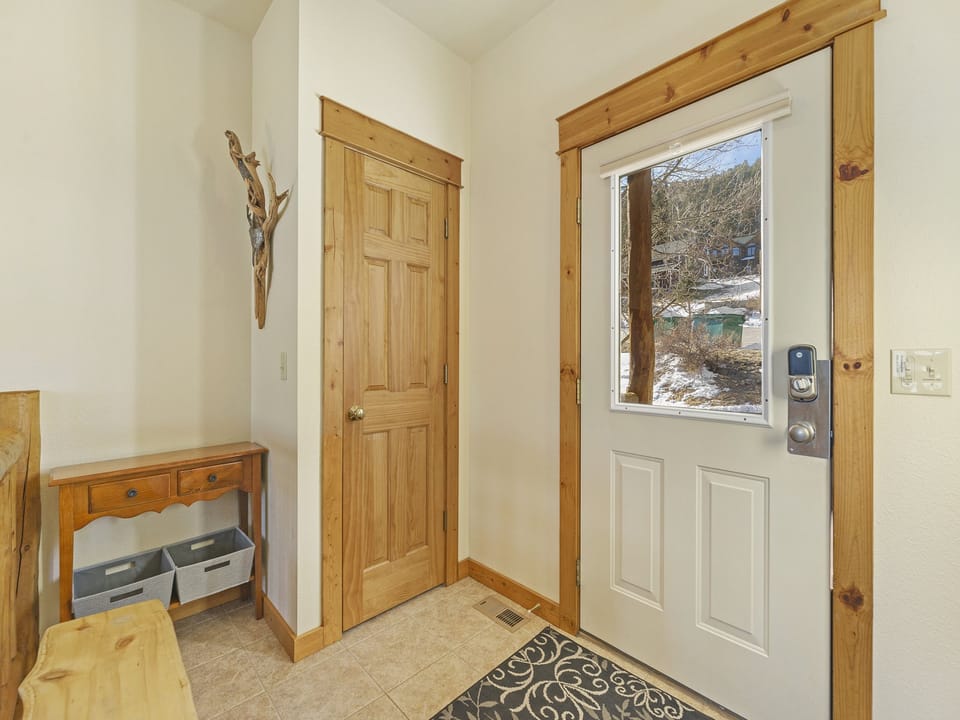Jackstraw Mountain 32 - Front door into condo's entry room.