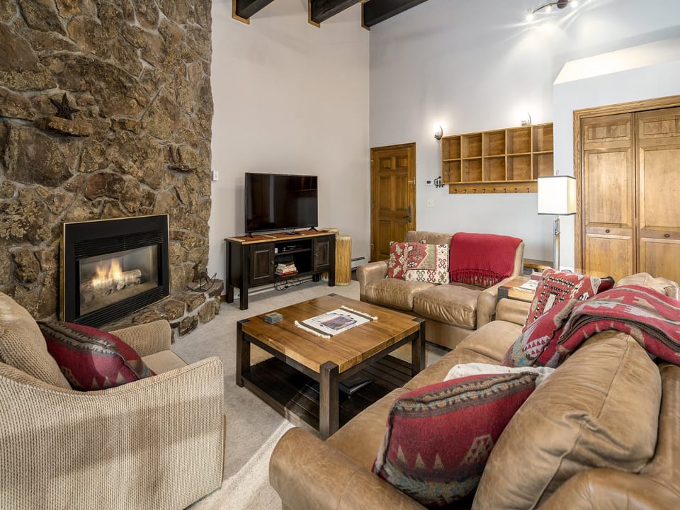 Entryway and large living area of this 4 bed, 4 bath dream condo!