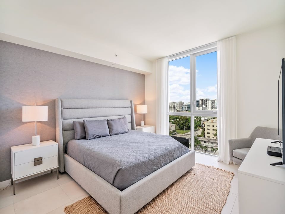 Spacious Master Bedroom featuring partial ocean views