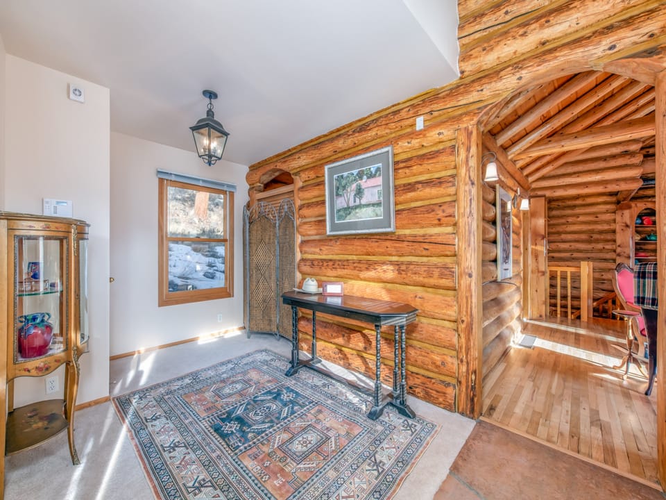 Bishop's Retreat - Main entry room filled with rustic charm.