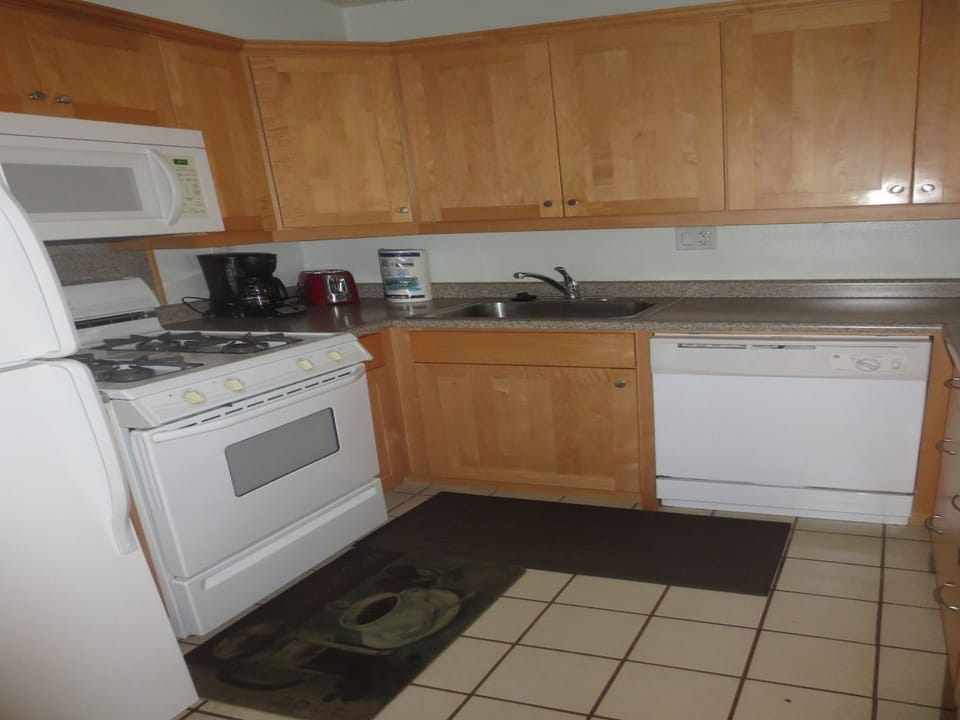 Kitchen with gas range/oven.
