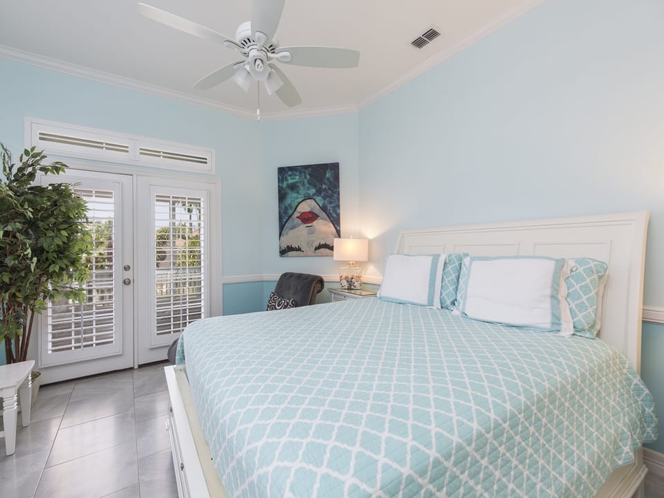 Master bedroom features a King Size bed and flat screen TV, as well as access to the 2nd floor deck.