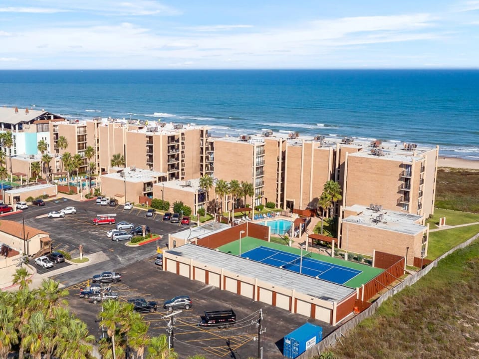 Stay in a beachfront community with private beach access, two pools and tennis courts.