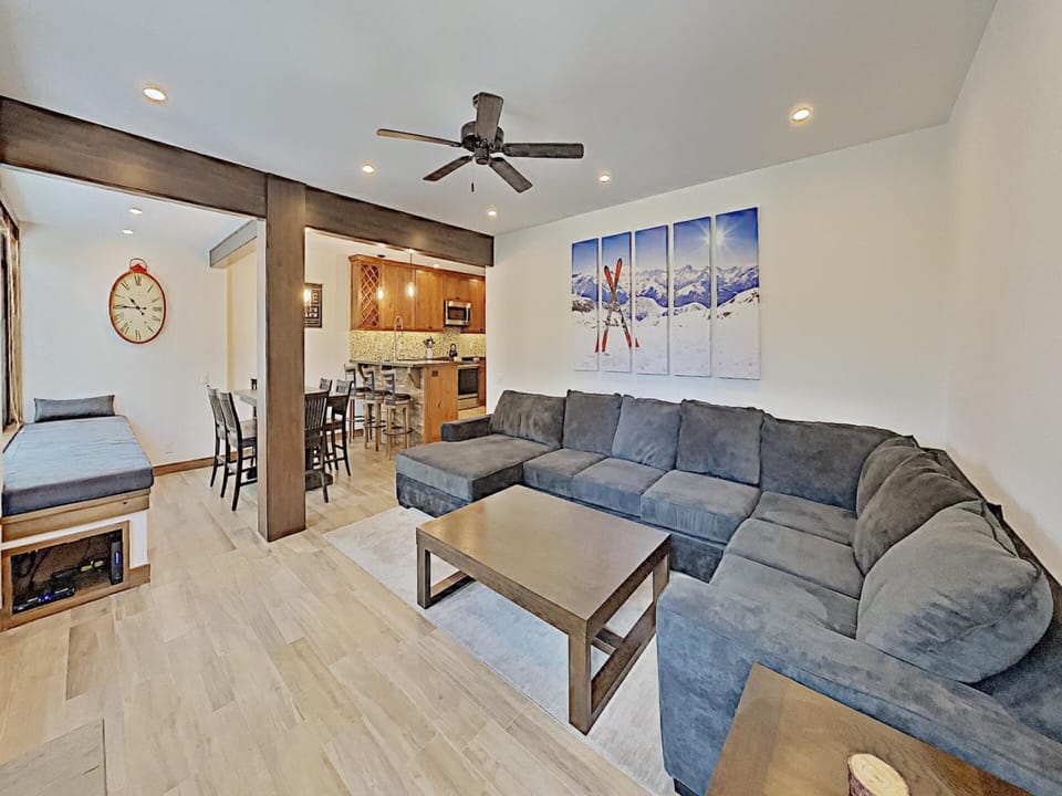 Full Living Room And Dining Room With Window Seat