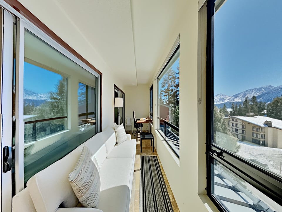 Comfy Sunroom for Reconnecting Over Coffee