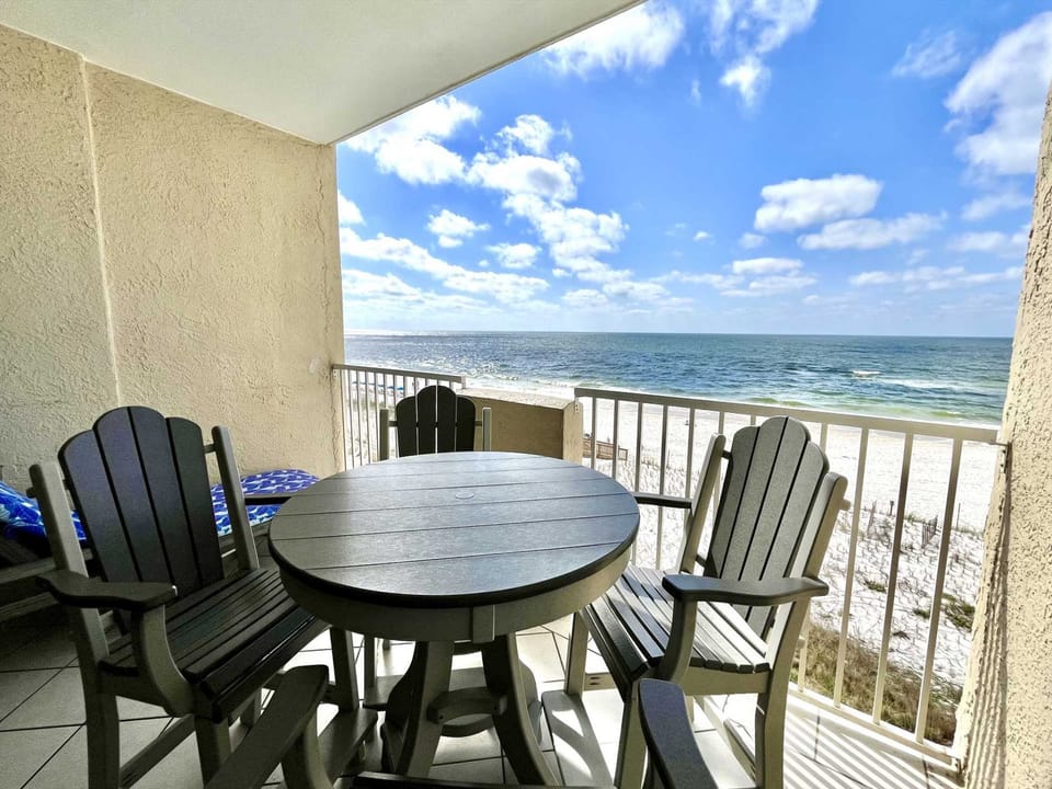 Pull up a chair - the view's amazing.  The Polywood balcony set is built for comfort, style, and soaking in every ocean breeze.