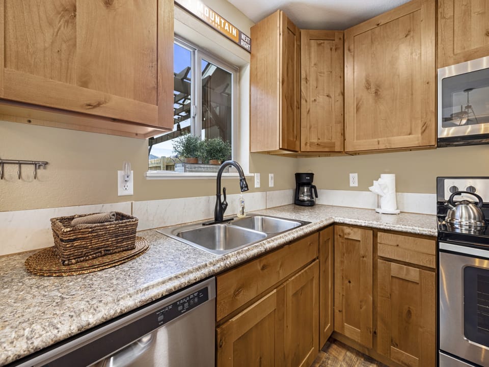 Serenity in the Rockies - Kitchen with a window above the sink
