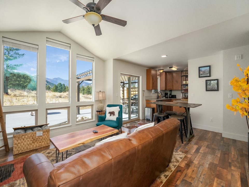 Serenity in the Rockies - Open concept living area.  Dining table is a high top with four stools.