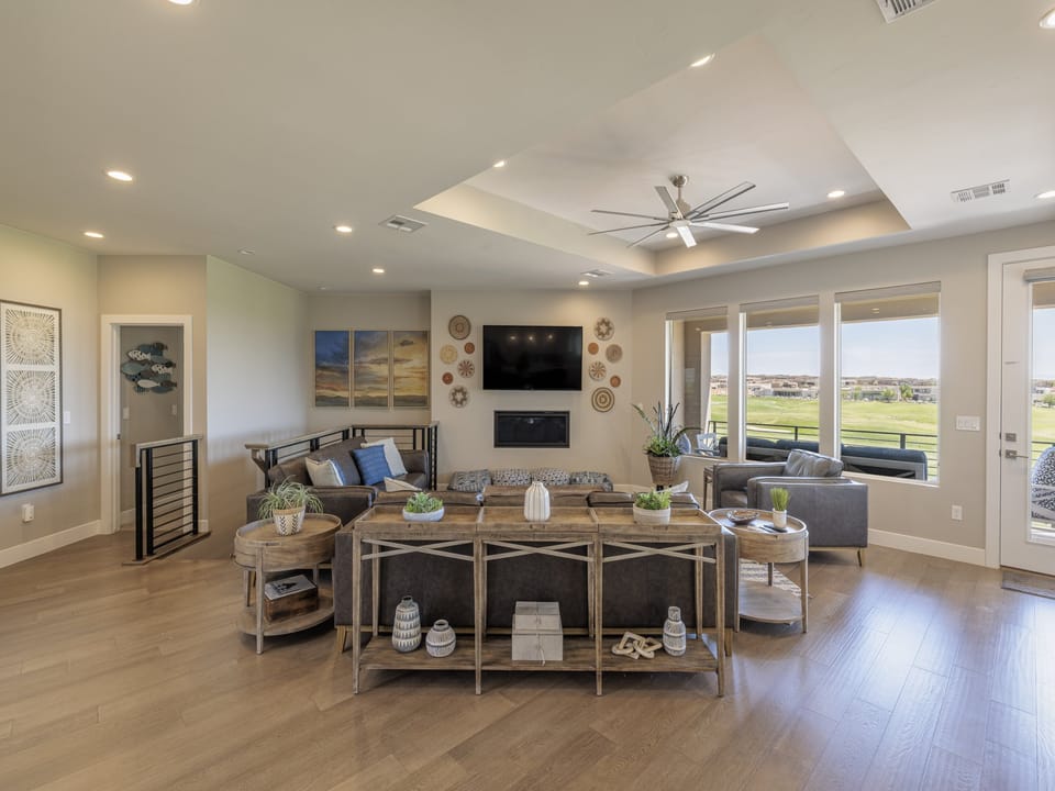 Enjoy the ambiance of the gas fireplace and/or watching the large flat screen tv.  The great room is even spacious enough for a dance party!