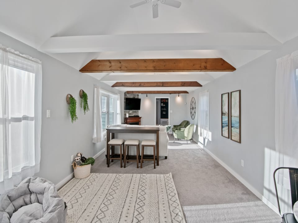 This is our "great room." A naturally lit, vaulted ceiling, living space perfect for cuddling up and spending quality time with family.