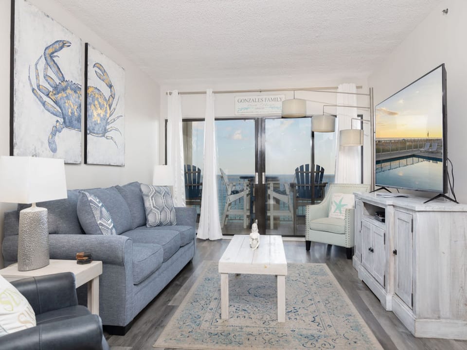 The spacious living area is beautifully furnished to make you feel right at home during your stay.