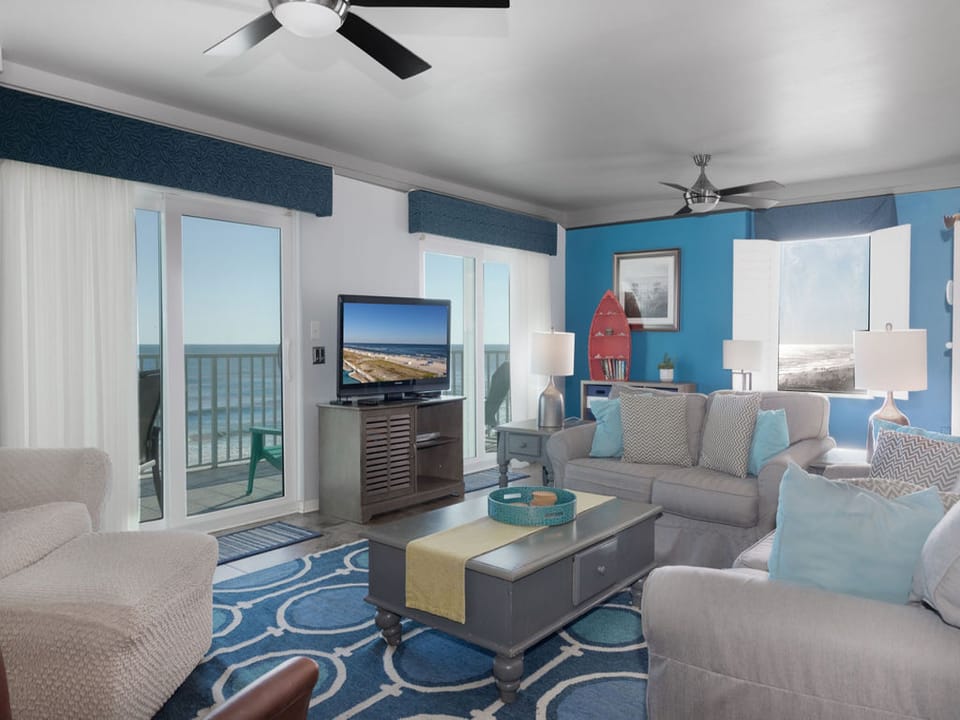 Relax in the living area and enjoy endless views of the Gulf!