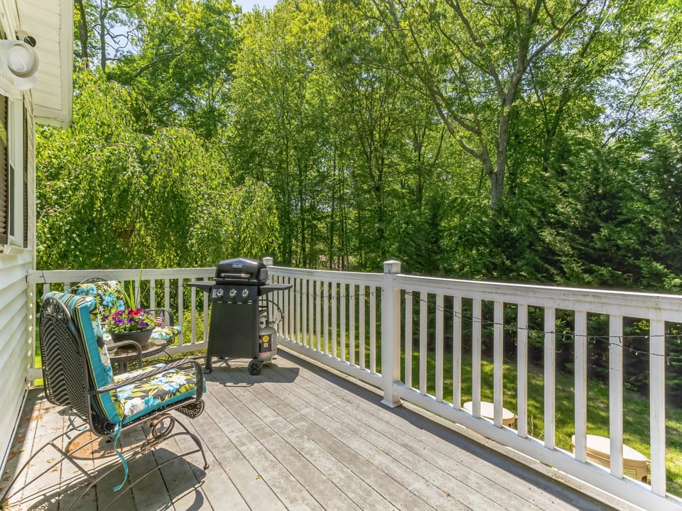 Private deck with grill and chairs