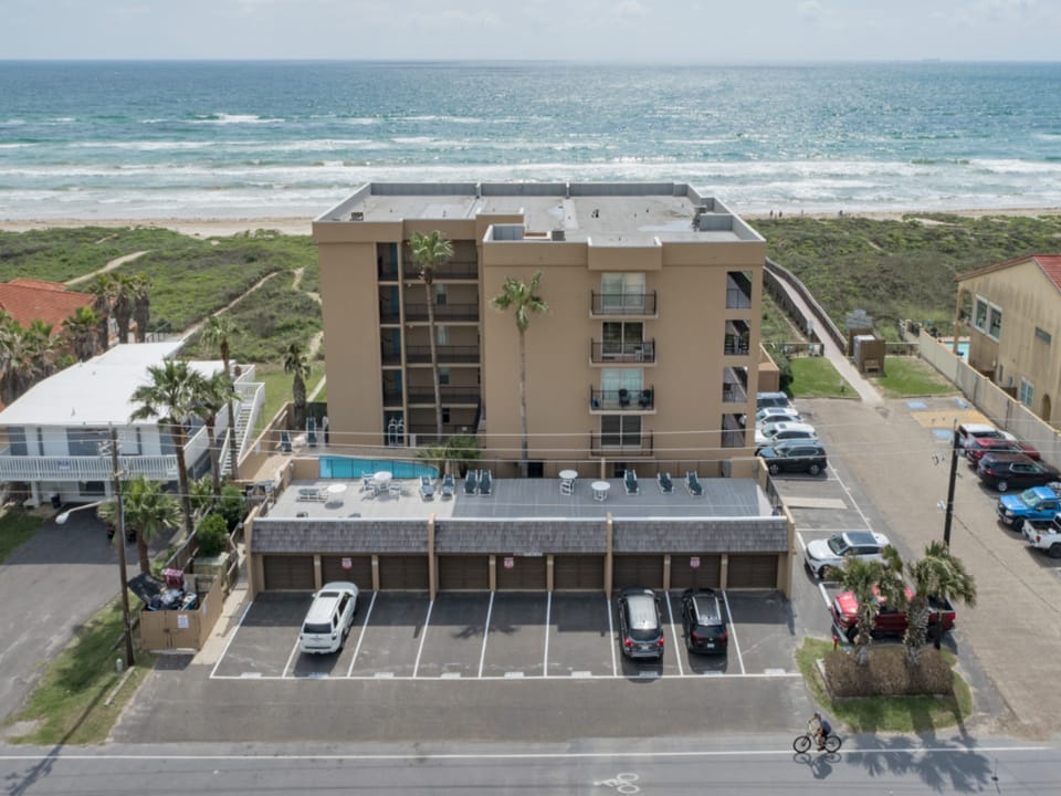 Ground-floor beachfront living with direct access to the sand from Seagull Condominiums.