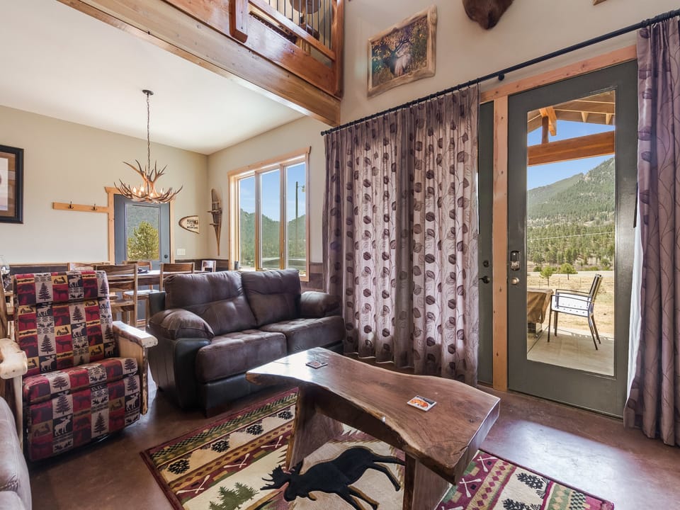 Show Me Mountain Views - The front door opens into the ground floor living area