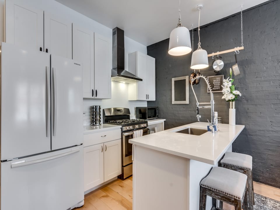 My bright white kitchen is equipped with everything you need to cook during your stay