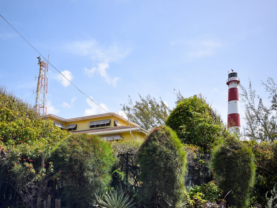 The famous South Point Lighthouse peeking out from the trees
