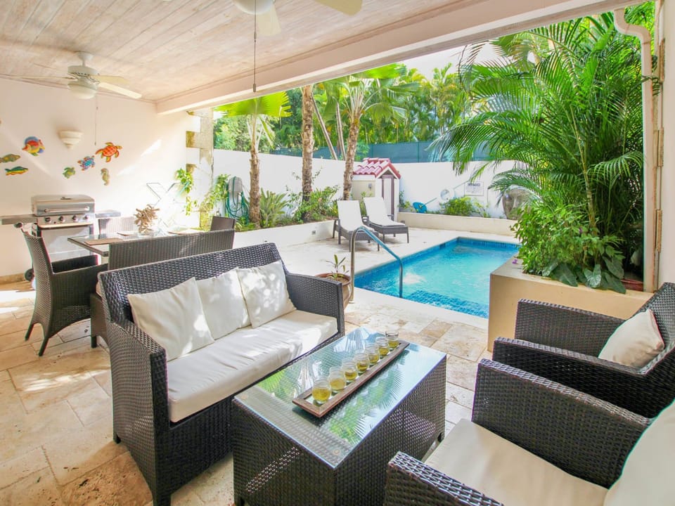 Comfortable lounge area overlooking the pool