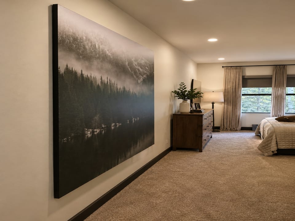 Your serene bedroom retreat awaits with soft carpet underfoot, elegant furnishings, and calming natural light filtering through the windows—perfect for unwinding after a day of adventure.