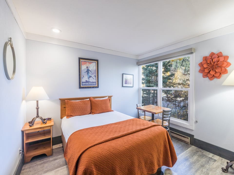Queen bed with window
