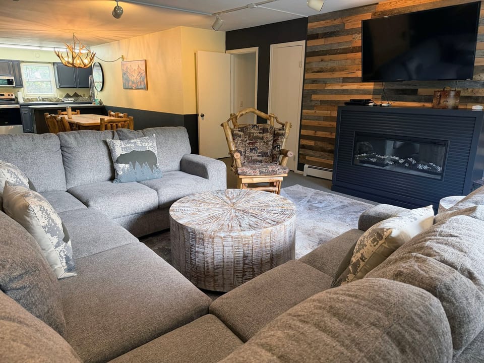Living Room with Decorative Fireplace
