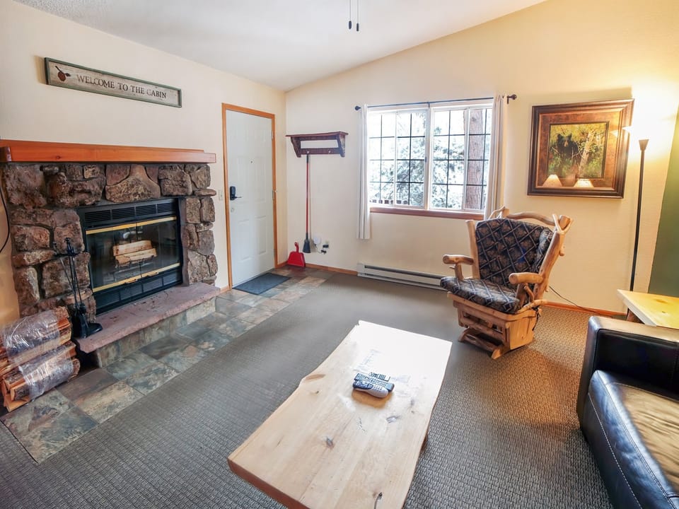 Living Room with Wood-Burning Fireplace