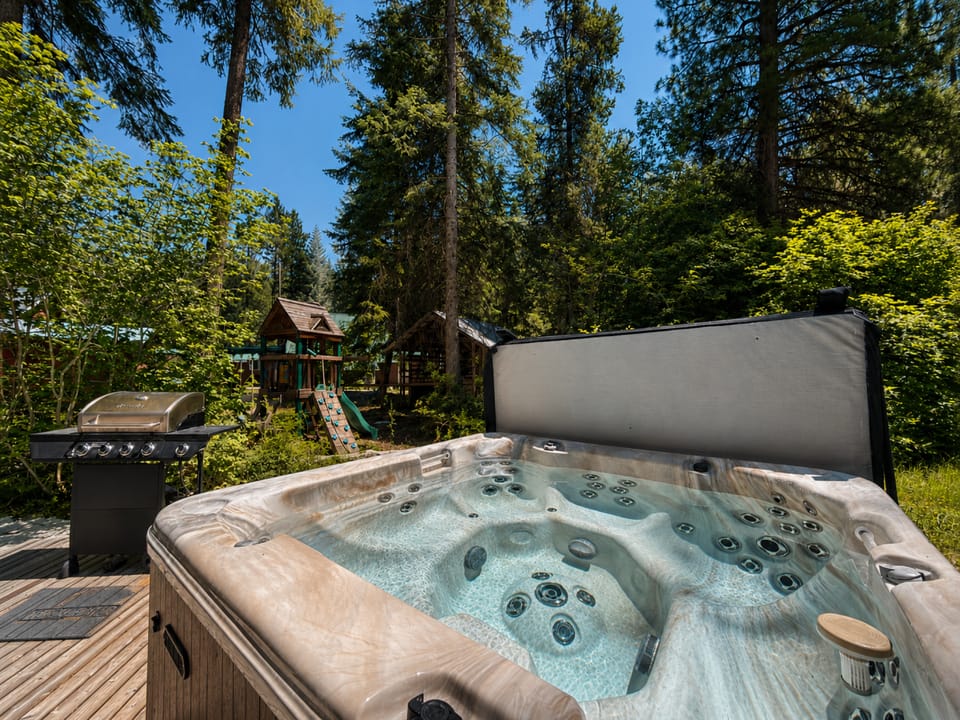 Private covered hot tub for stargazing and relaxing.