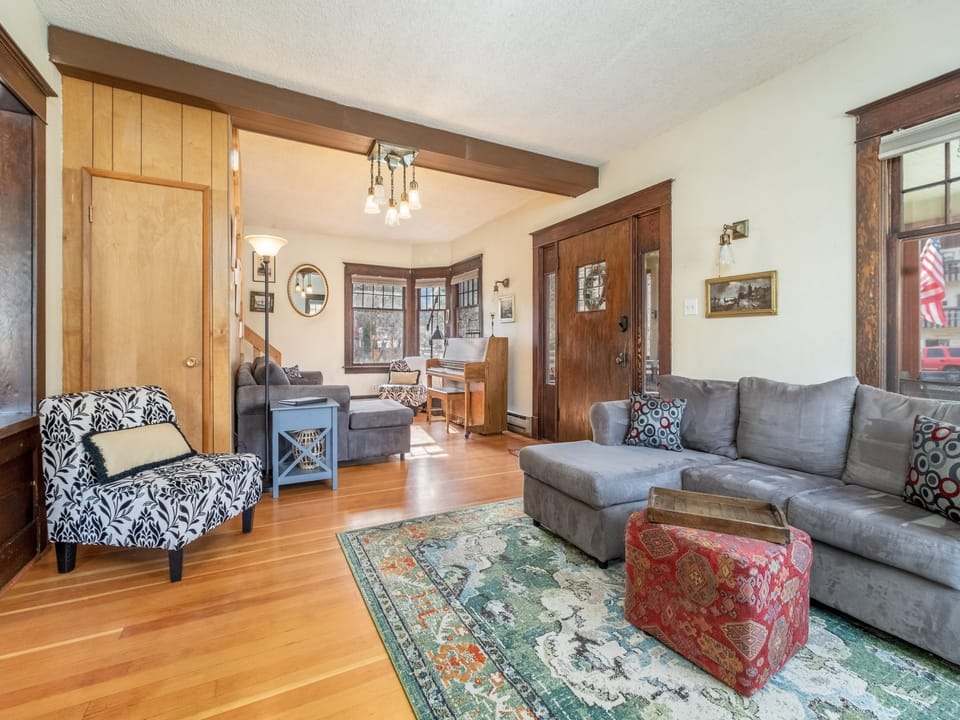 Cozy living space with cable and Smart TV for streaming