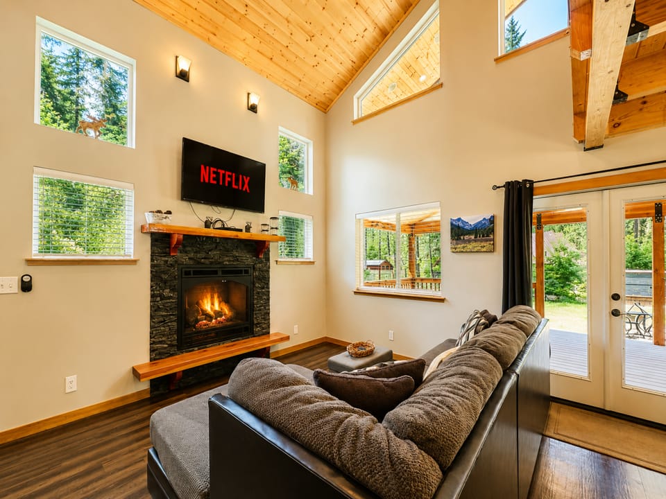 Stretch out and enjoy some quality comfort with a movie by a fire.