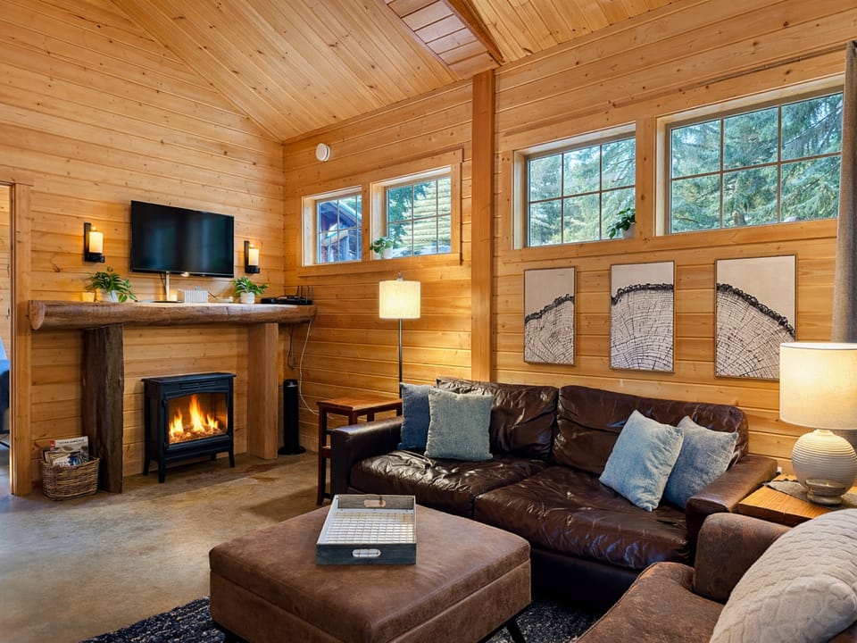 Sink into the plush leather sofa and watch flames dance in the cozy fire place.