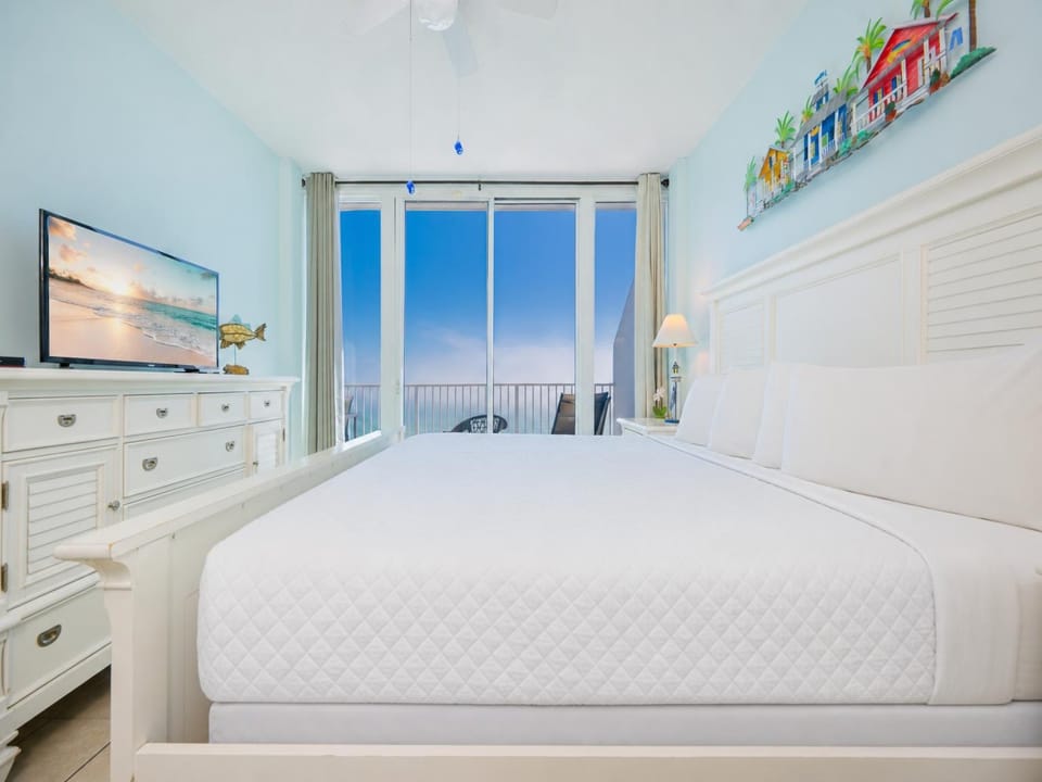 Gentle light brightens the suite as you enjoy a peaceful morning with calming coastal views beyond your balcony