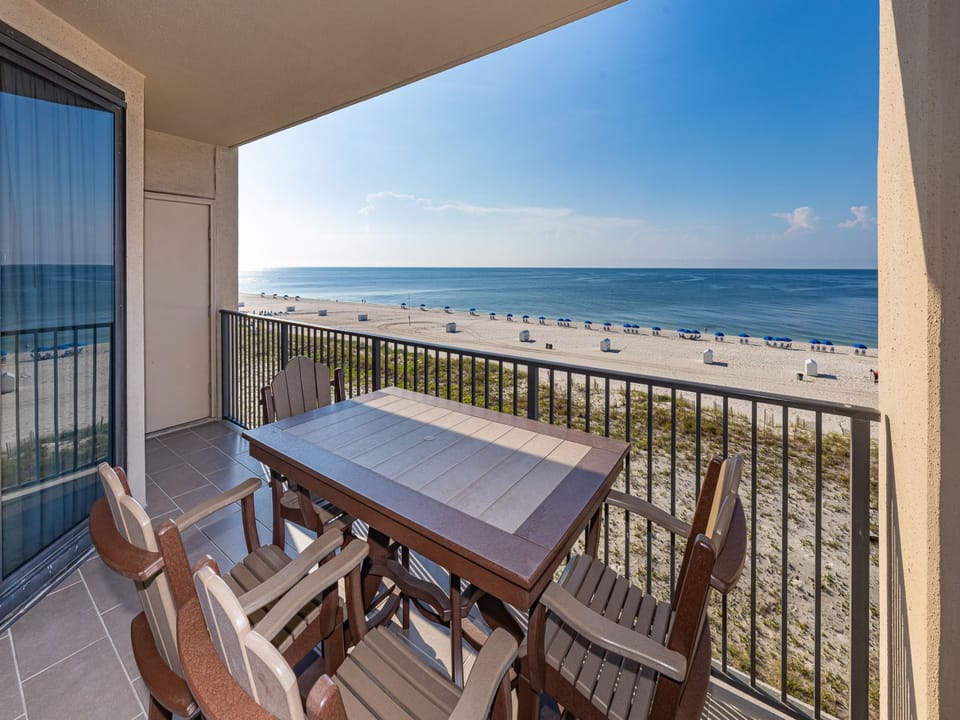 Your balcony invites you to savor warm breezes while watching waves kiss the white beach below