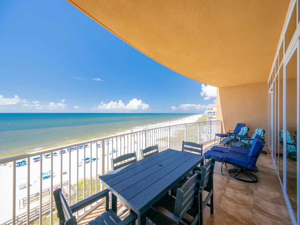 Relax on the spacious balcony, soaking in the coastal breeze while enjoying stunning views of the beach