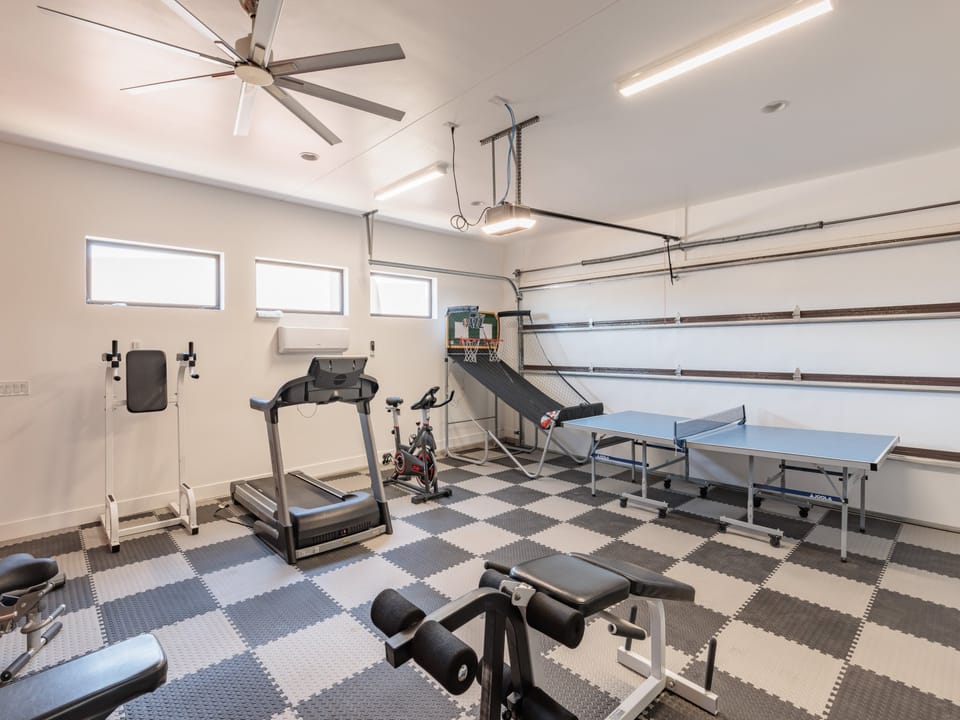 The gym includes a 2 player basketball game and ping pong table.