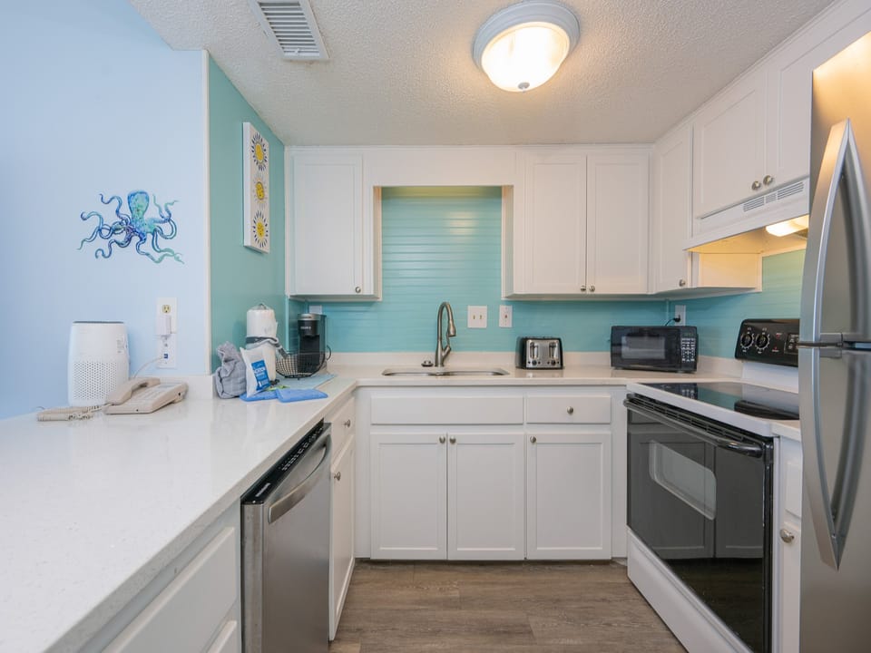 Embrace the coastal vibe while crafting your favorite meals in this charming kitchen