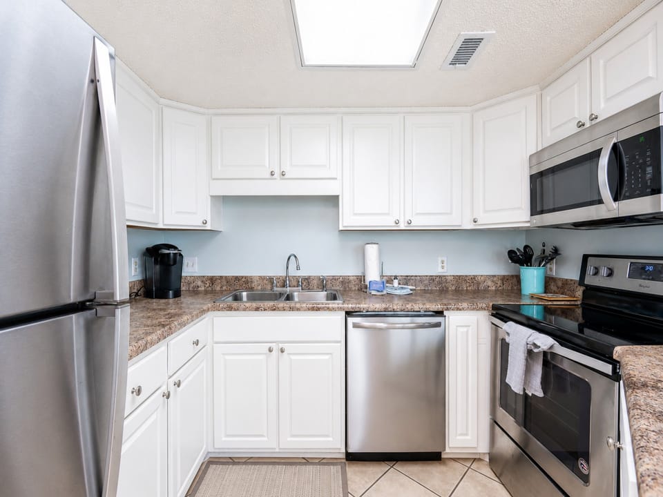 Breakfast bar invites you to chat while preparing fresh meals in your cozy kitchen