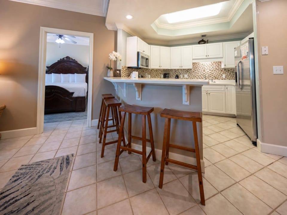 Gather around the inviting breakfast bar, savoring memorable moments before exploring the surroundings