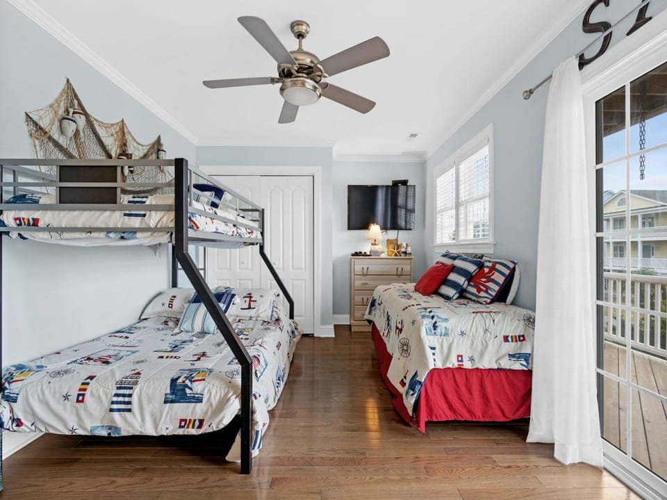 Lower Level Streetside Twin and Pyramid Bunk Bedroom with Deck Access