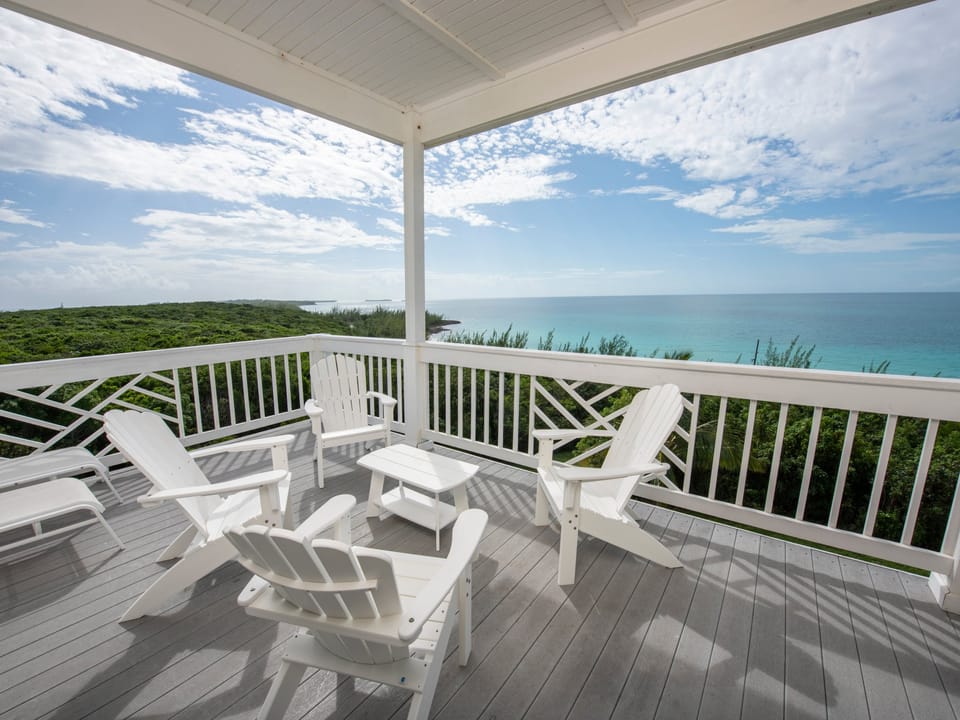 View from the west deck. This huge deck is 20 x 14 feet (the photos don't convey the size). This condo has ocean views from every window, with views of both Atlantic and Caribbean.