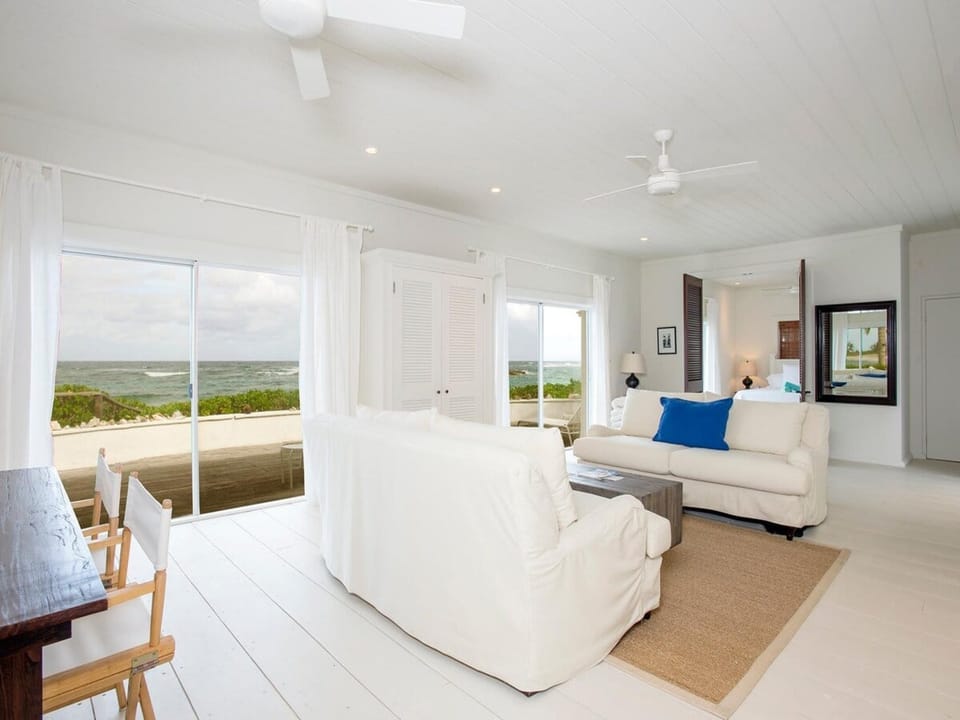 Newly remodeled dining area and great room with spectacular beach and ocean views from every window.