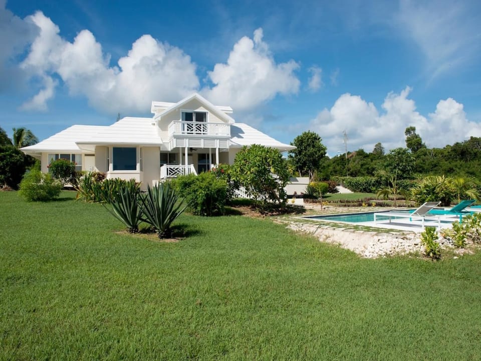 East façade and pool.
