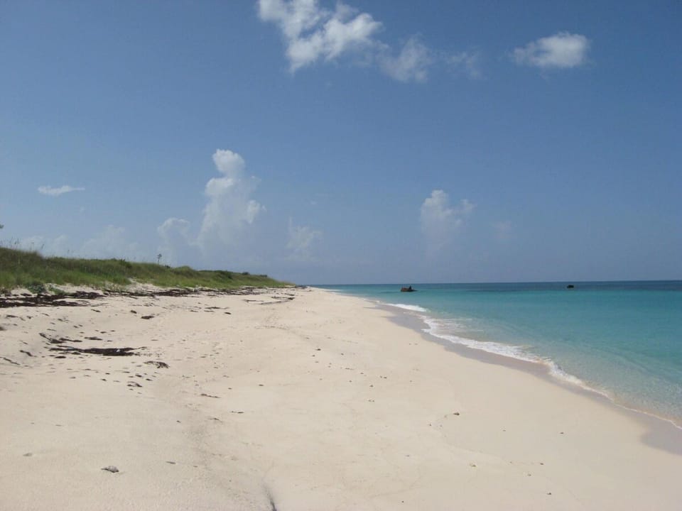 Buttonwood Beach, our miles-long private beach.