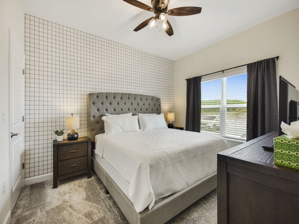 Master suite - king bed and has its own en-suite bathroom with his and hers sink.