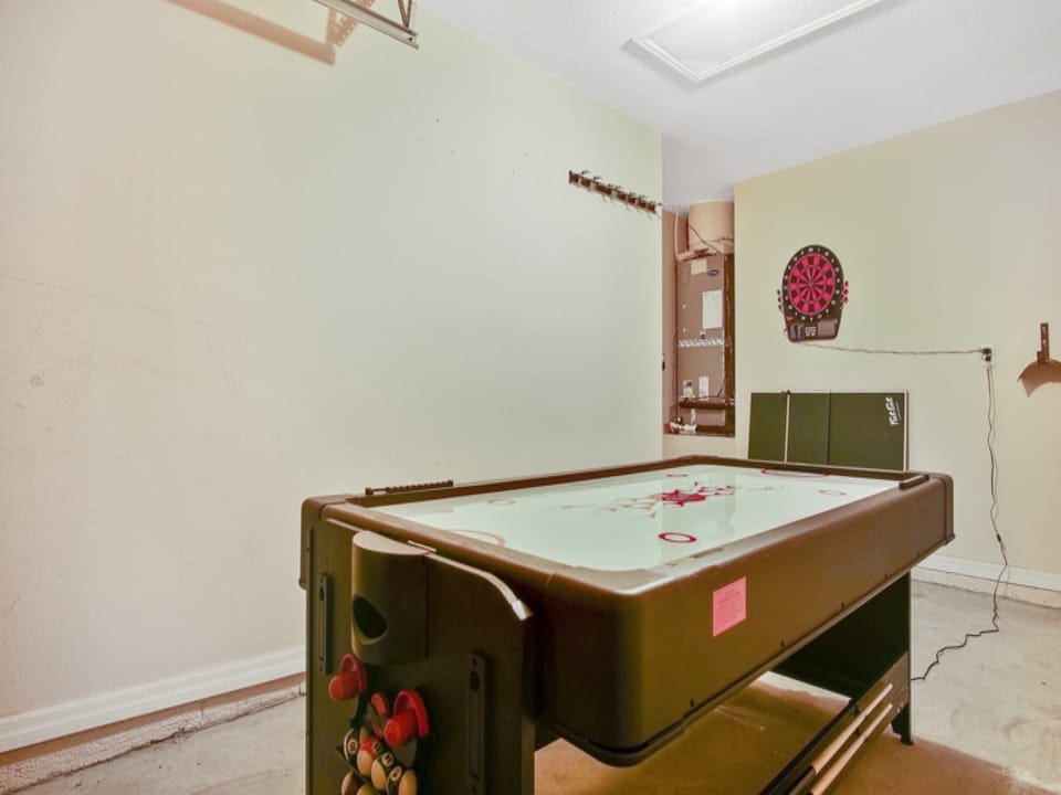 Games Area which has an electronic dart board and Pool Table