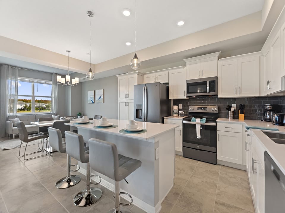 Fully-equipped kitchen with a breakfast bar